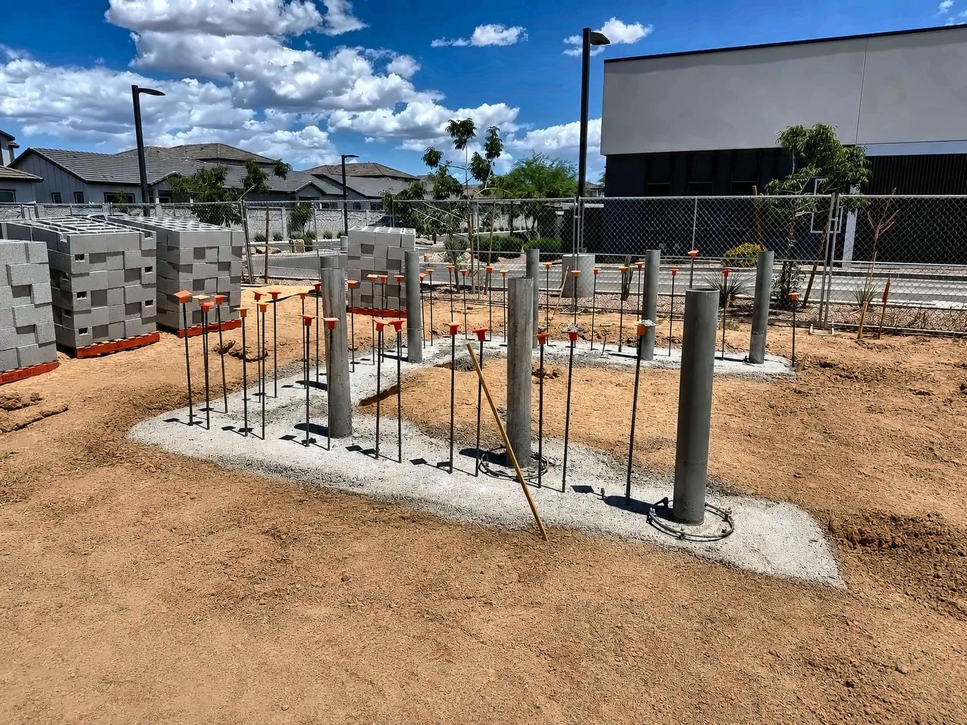 CMU wall footing — steel bollards